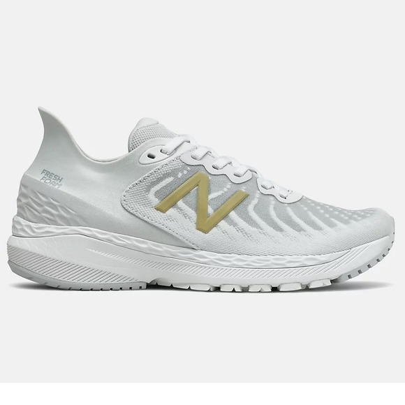 New Balance White and Gold Athletic Shoes - Picture 1 of 8